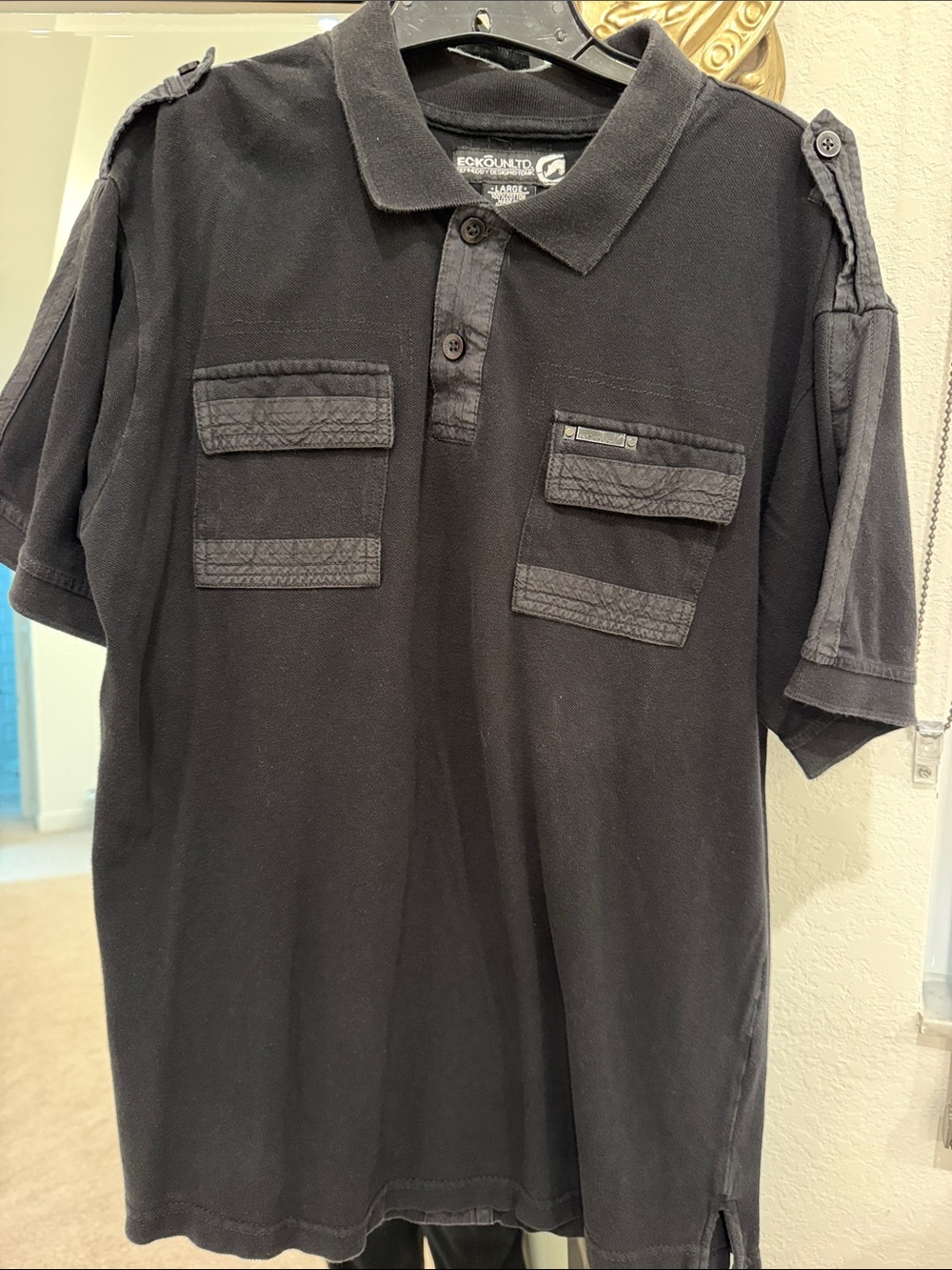 Ecko Unlimited Black Short-Sleeve Polo with Dual Chest Pockets